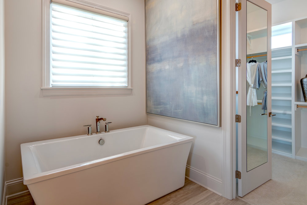 This destination bathtub from the 2018 Home-A-Rama steals the show in the master bath.