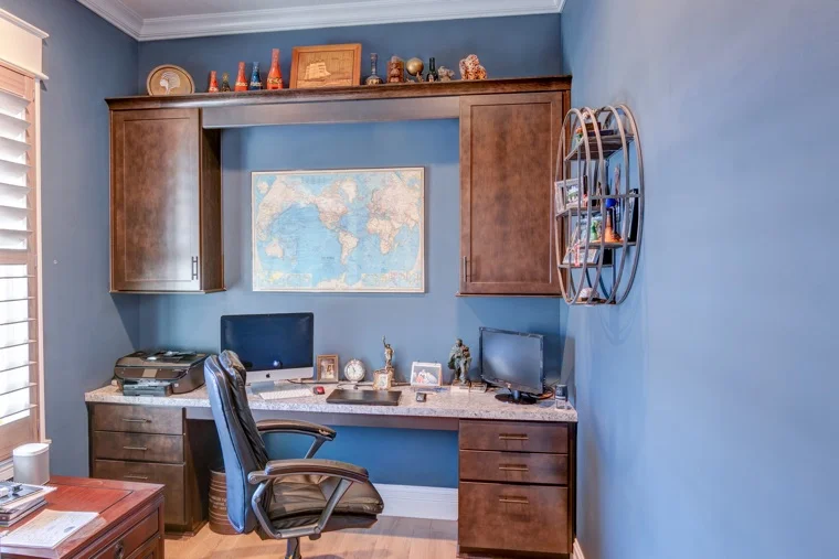 Installing an outlet that's desk high will stop you from dealing with computer cords on the floor.