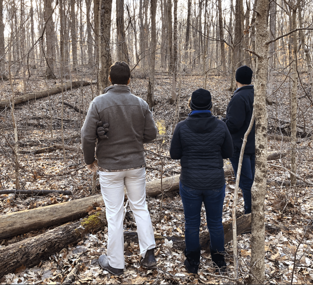 Director of Construction, Matt Huffman while on a lot walk in Holliday Farms with a potential client.