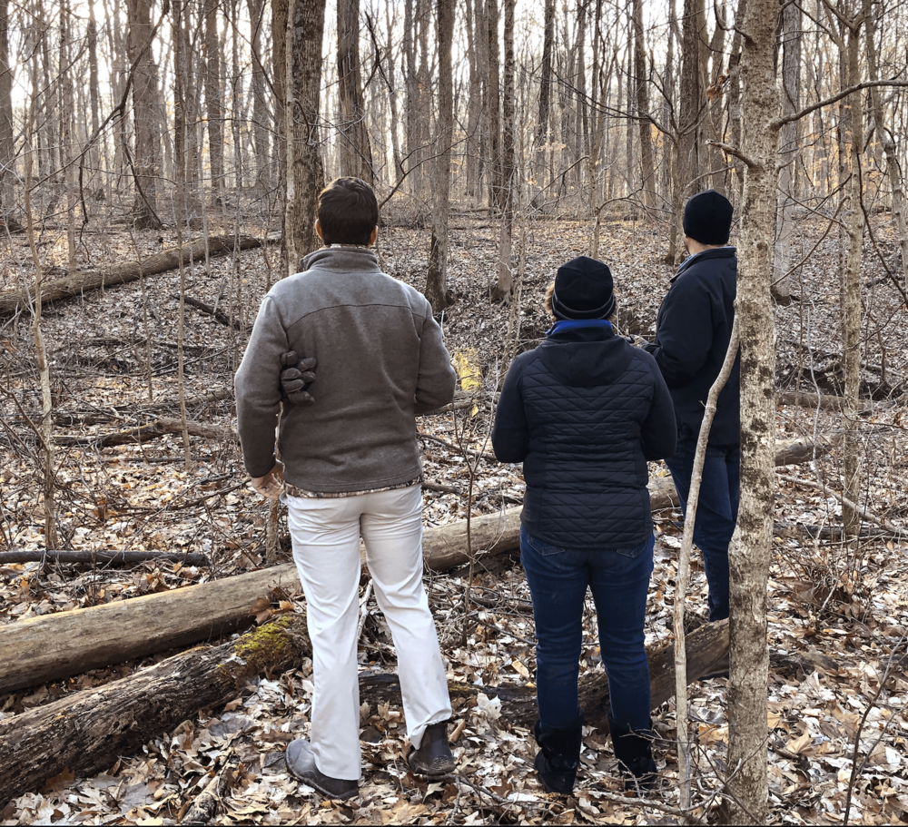 Director of Construction, Matt Huffman while on a lot walk in  Holliday Farms  with a potential client.