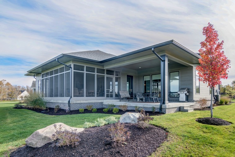 A sun room is a great way to enjoy the serenity of a golf course view -- even in the winter.