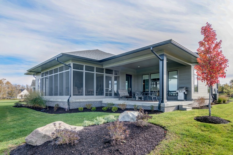 A sun room is a great way to enjoy the serenity of a golf course view -- even in the winter.