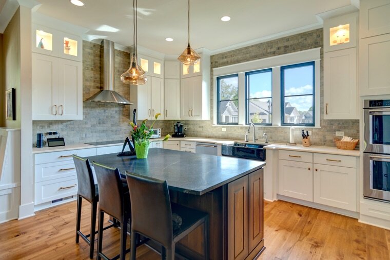 The double ovens are nice, but upgrade the kitchen island first.