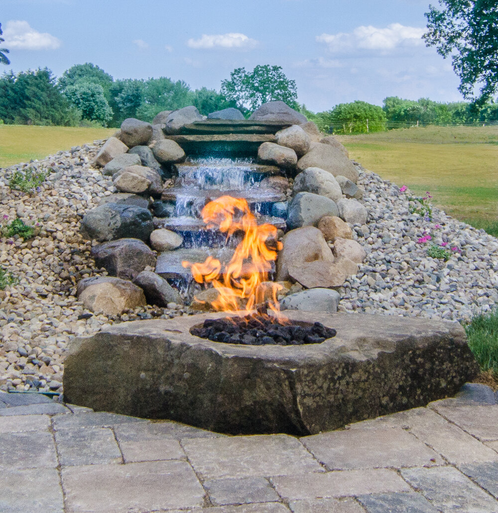 A gas log fire-pit and water feature is great -- unless it strains your budget