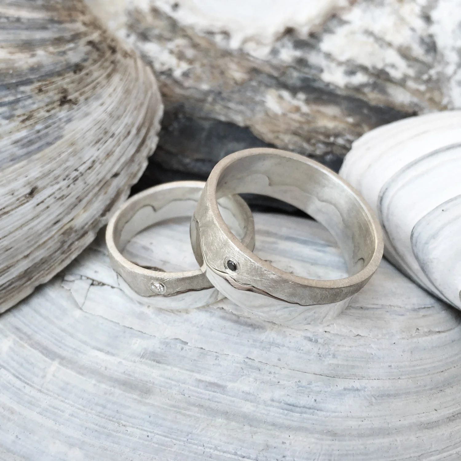 HannahLouiseLamb-silver-coast-rings-with-black-and-white-diamond.jpg