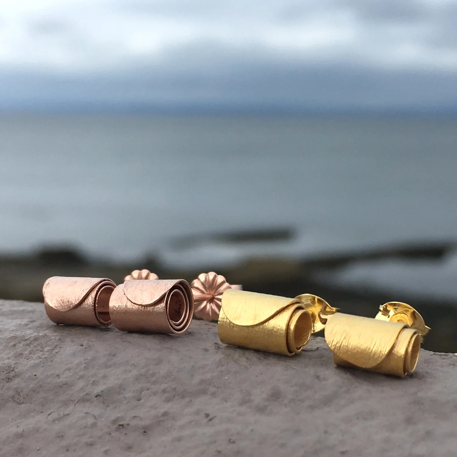 HannahLouiseLamb-rolled-wave-gold-plated-earrings.jpg