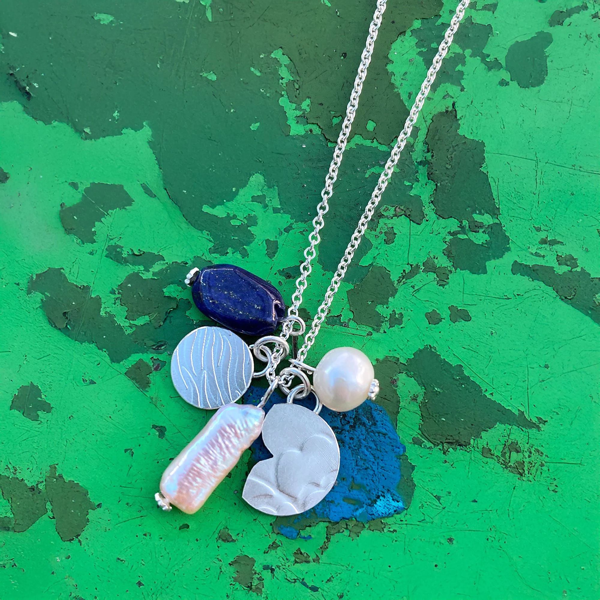 Pearls,-Silver-Charms-and-Lapis-lazuli-Pendants-Multi-Charm-Necklace.jpg