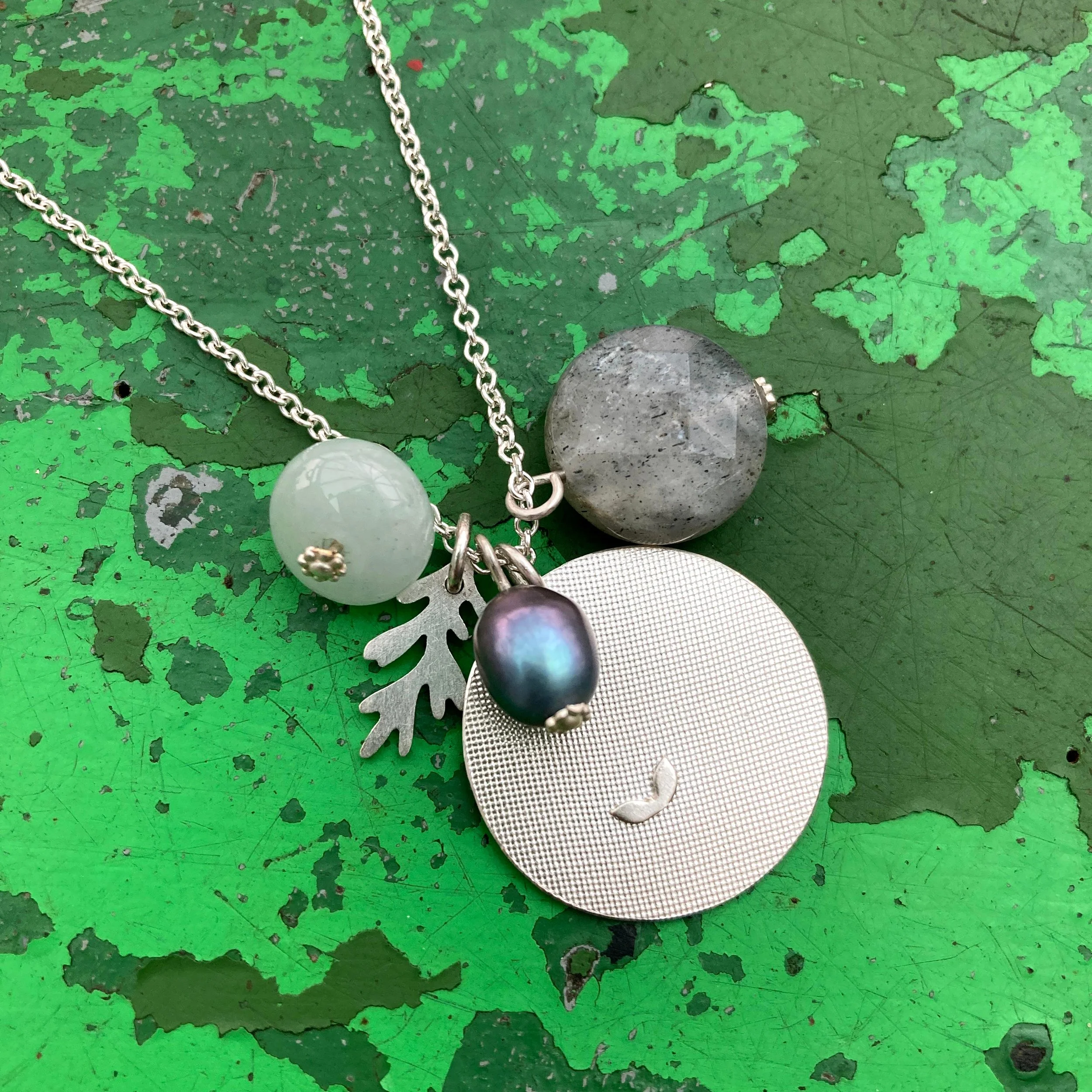 Large Textured Cirlcle, Seaweed Charm and Gemstones.jpg