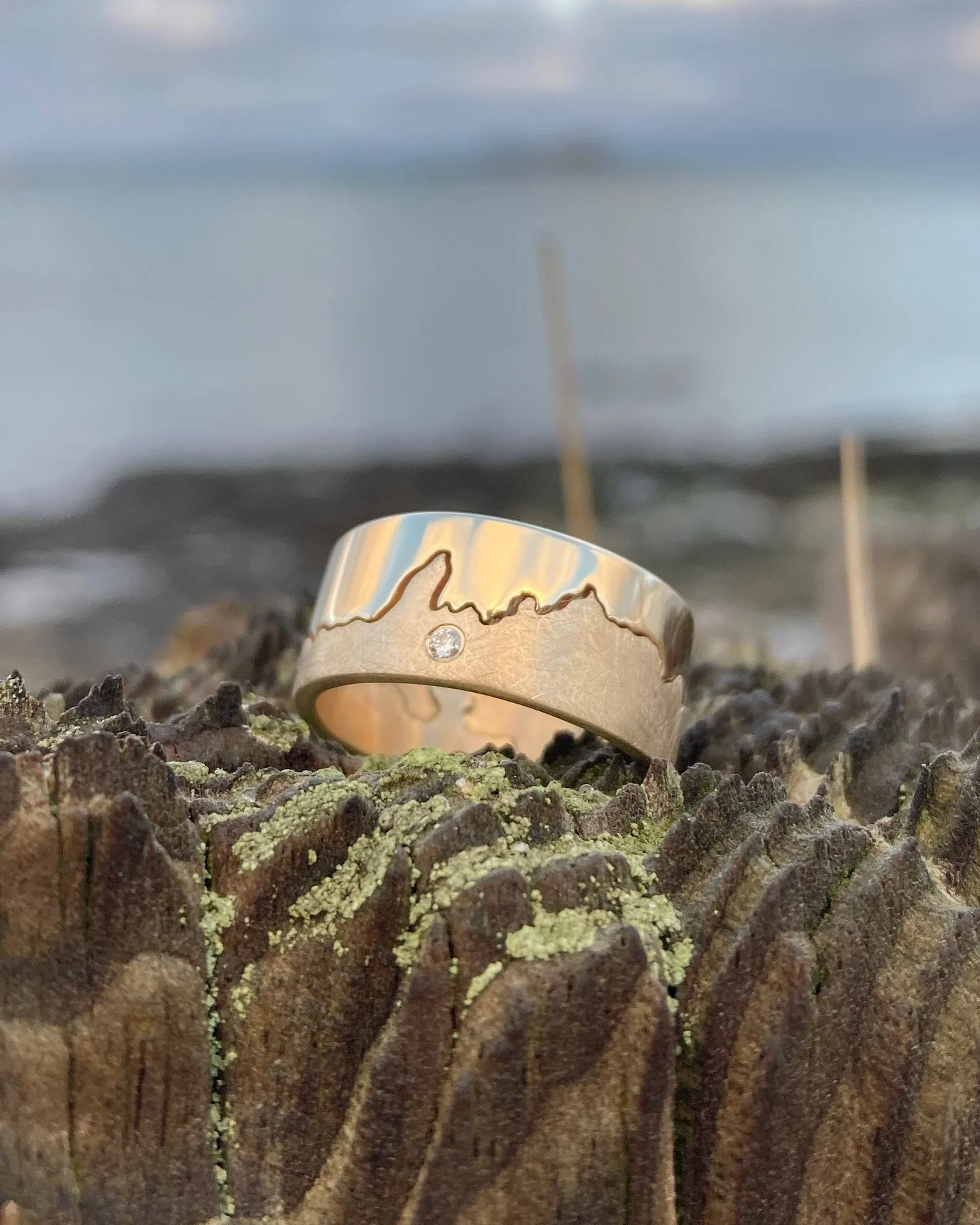 Gold coastline ring with diamond marker, inspired by a coastline from the Island of Kerrera in Scotland