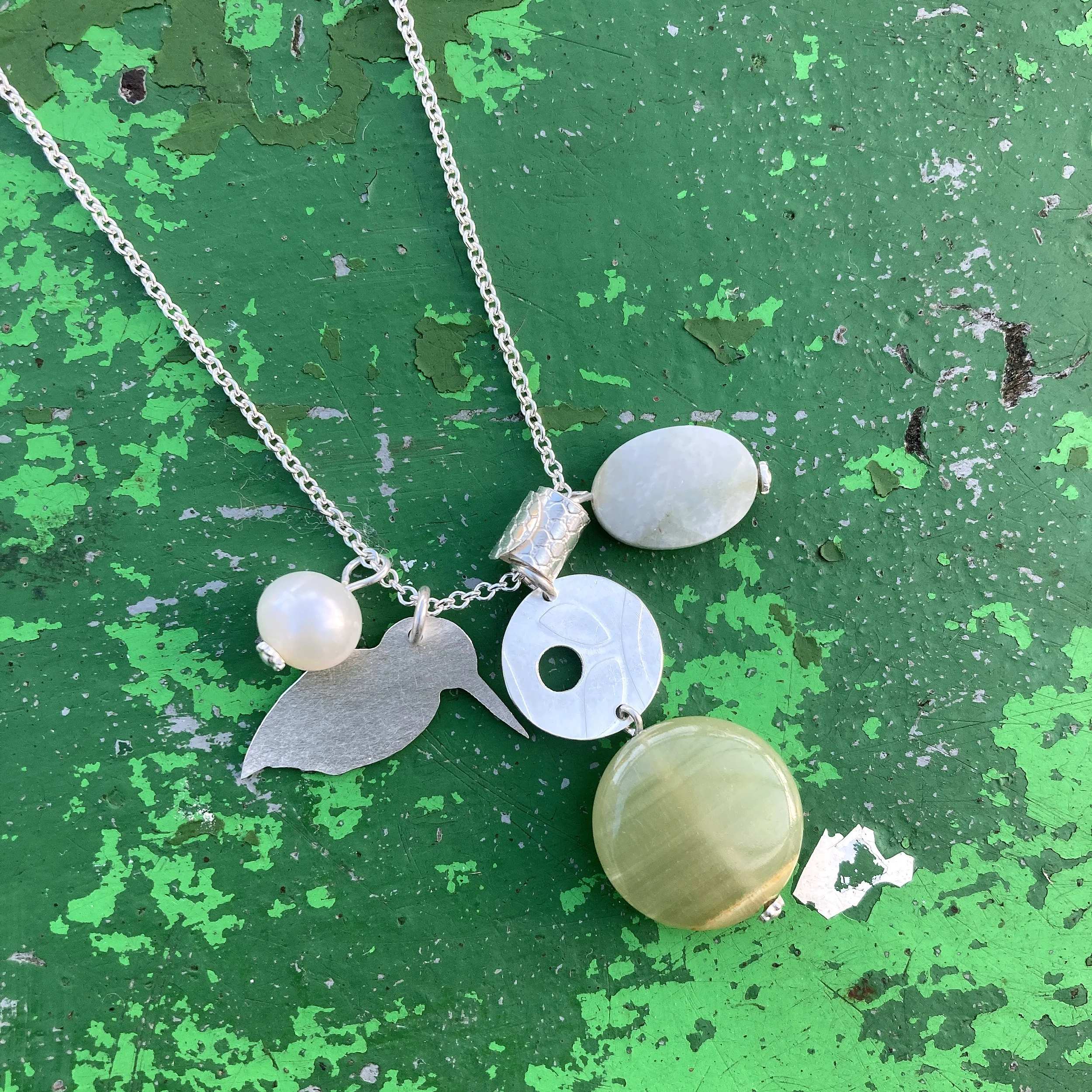 Seabird, rolled wave and Dangle charm pendant necklace.jpg