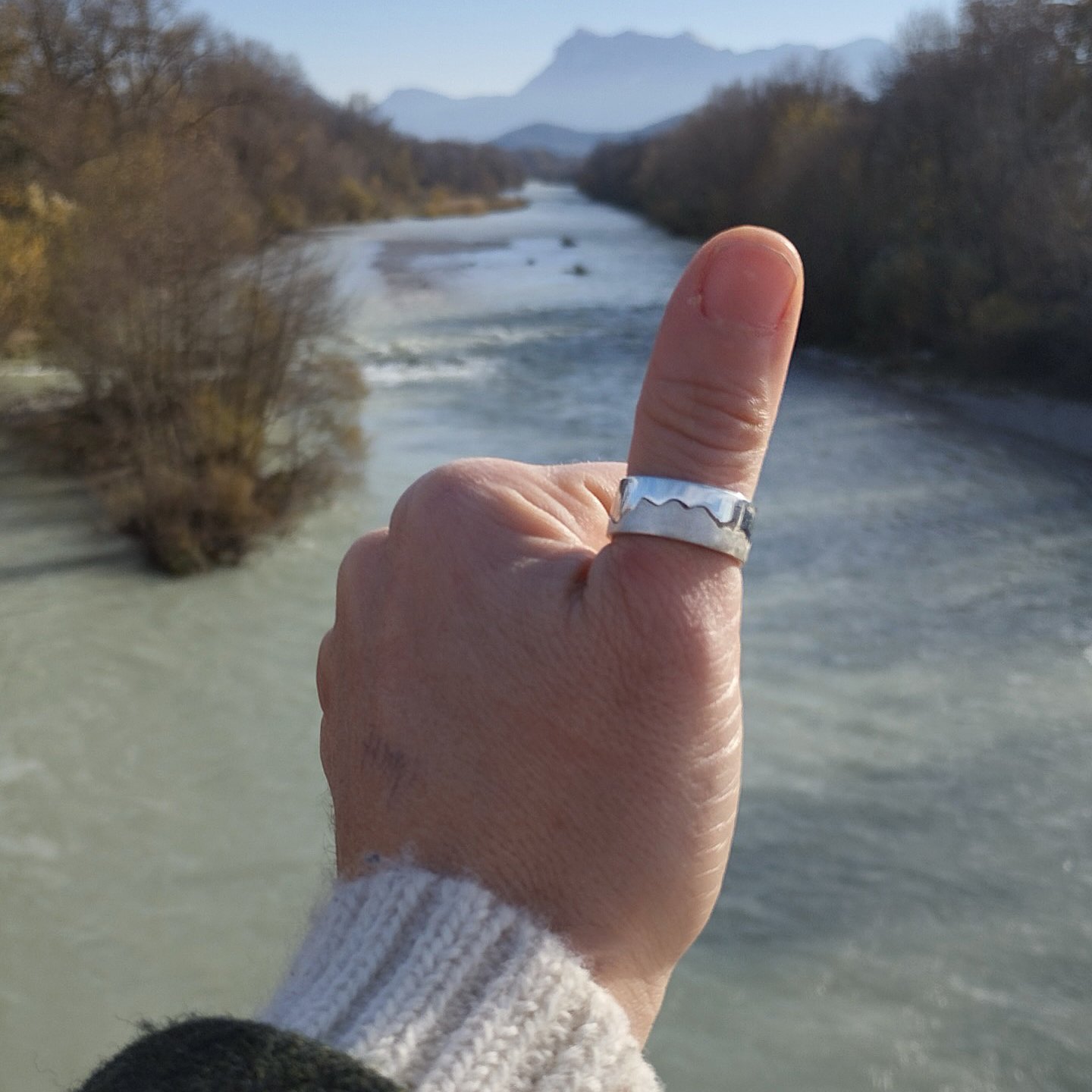 Custom men's marathon route ring on hand