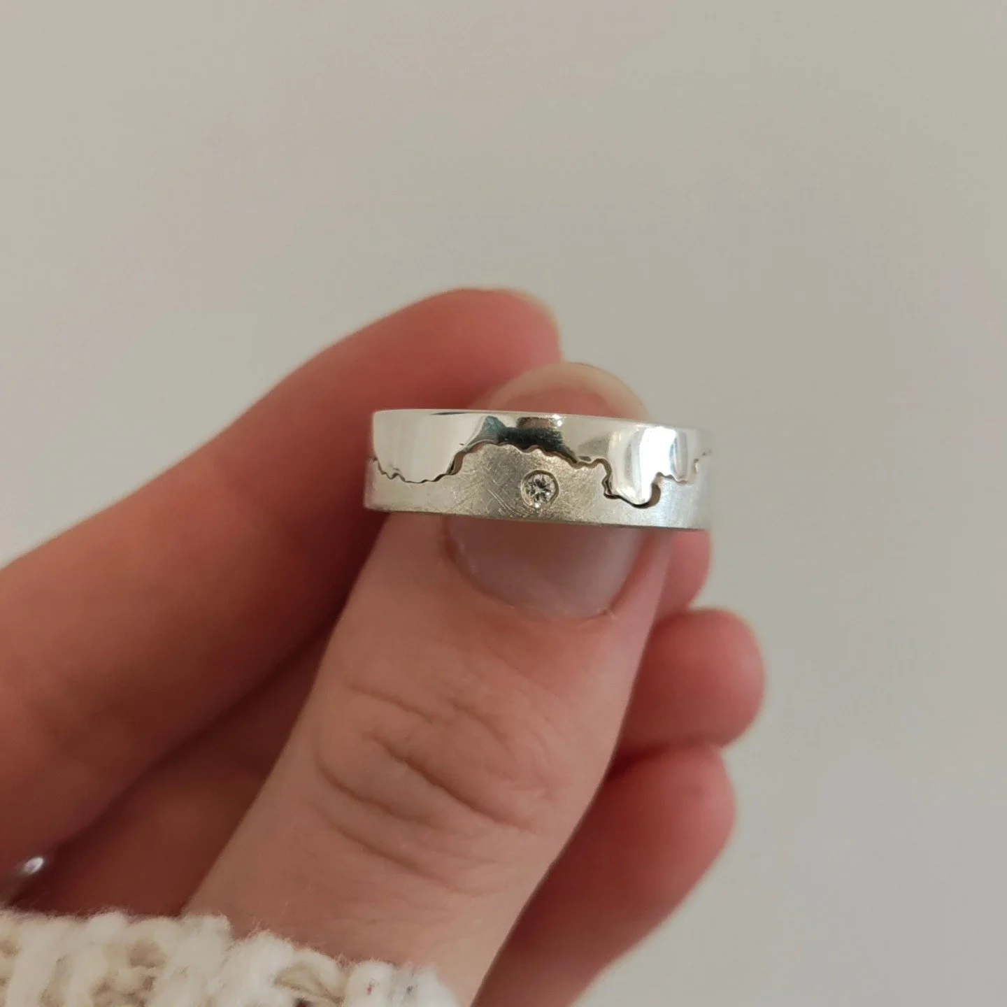 Sterling Silver Ring with Plymouth Barbican Hand Pierced in the centre. 