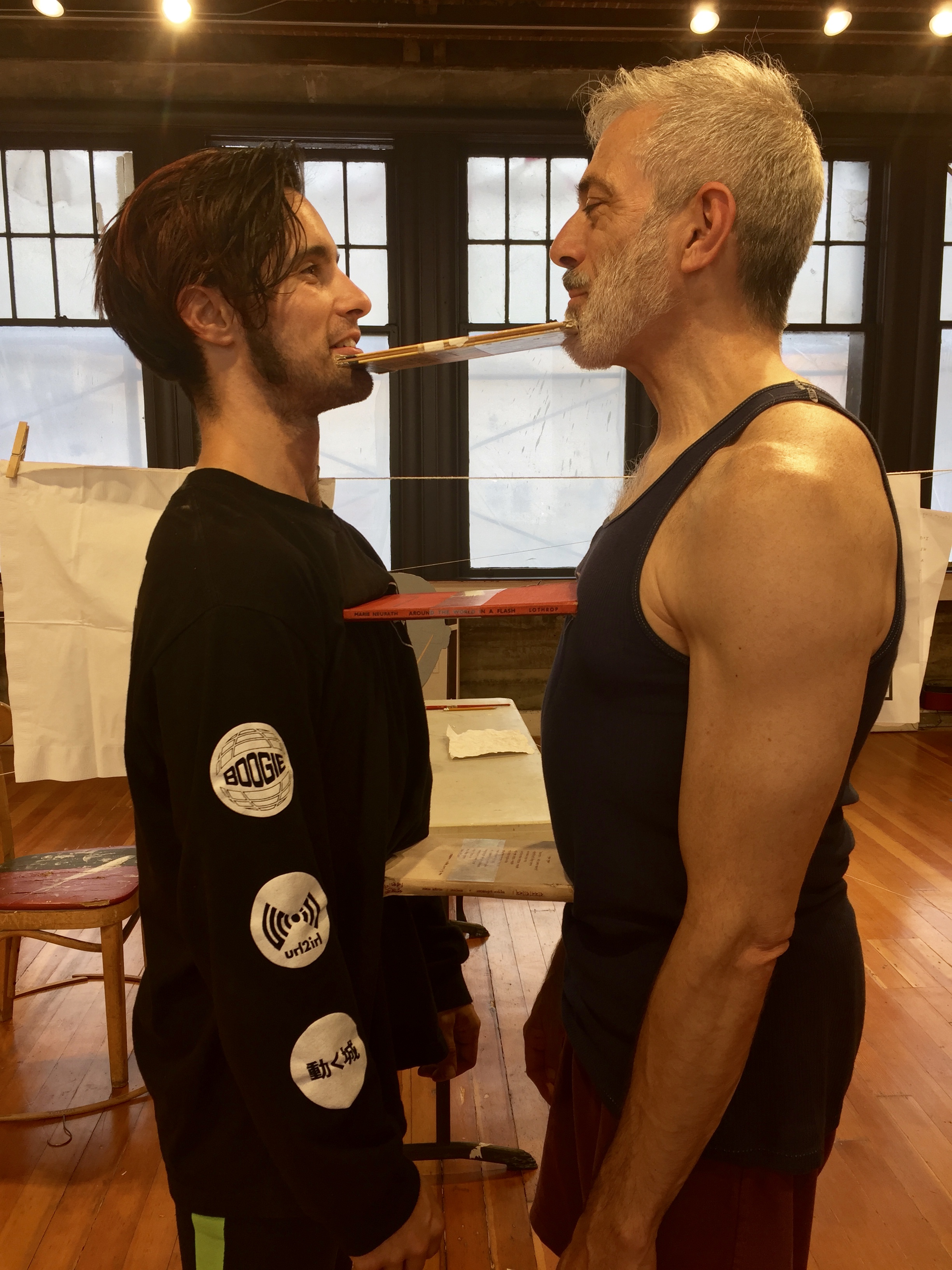 Colin Creveling and me co-supporting books, in rehearsal in June at CounterPulse.
