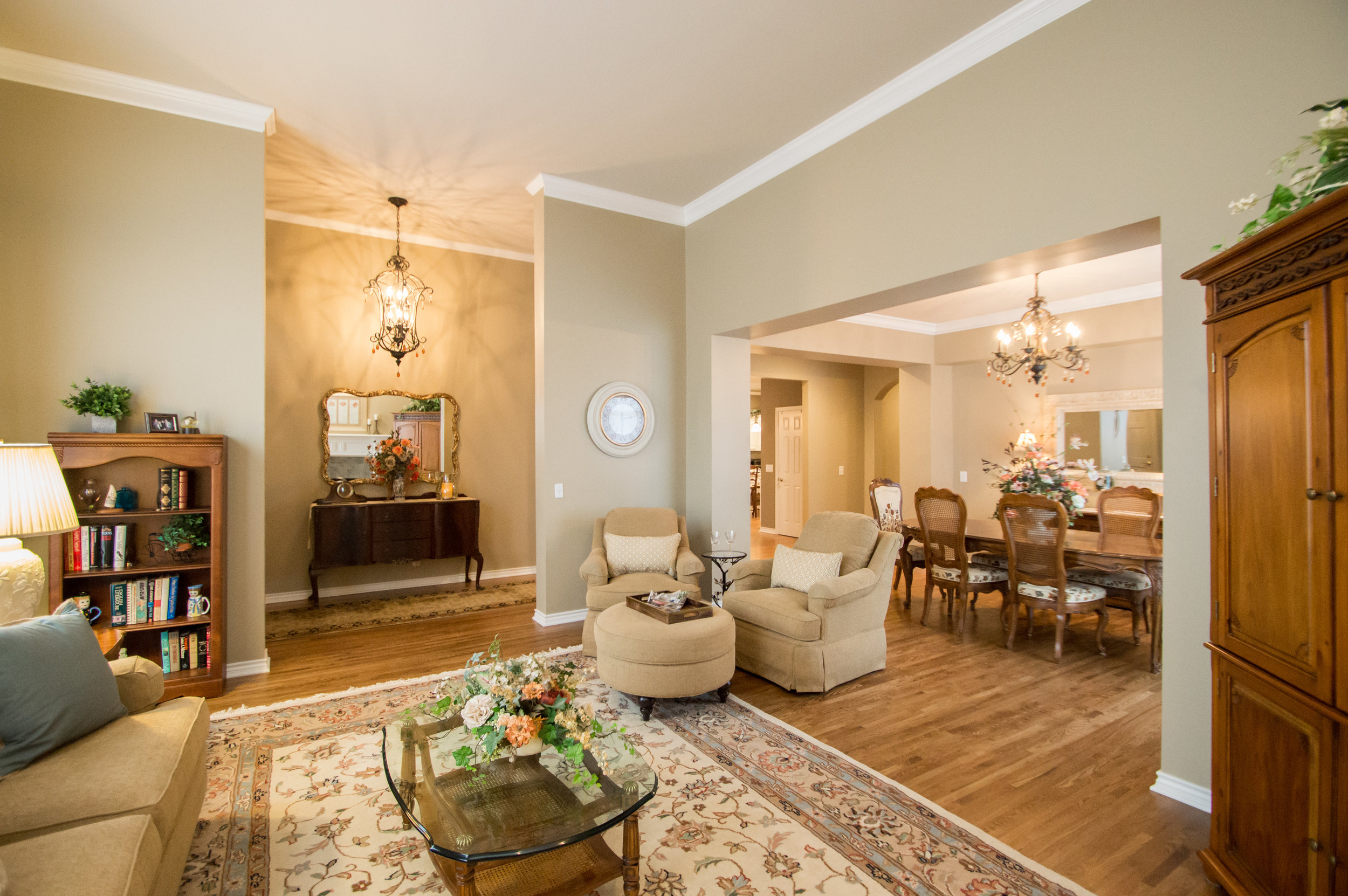 "I absolutely love the new open floor plan with beautiful wood floors AMIAN Homes created for me. The kitchen was closed off, and Amy and Ian took out a wall which opened up the house and made it look twice as big. They did excellent work and finished the project out to make my home even more beautiful. I would highly recommend AMIAN Homes to anyone who wants the best at a reasonable price." - Mary Ann D.