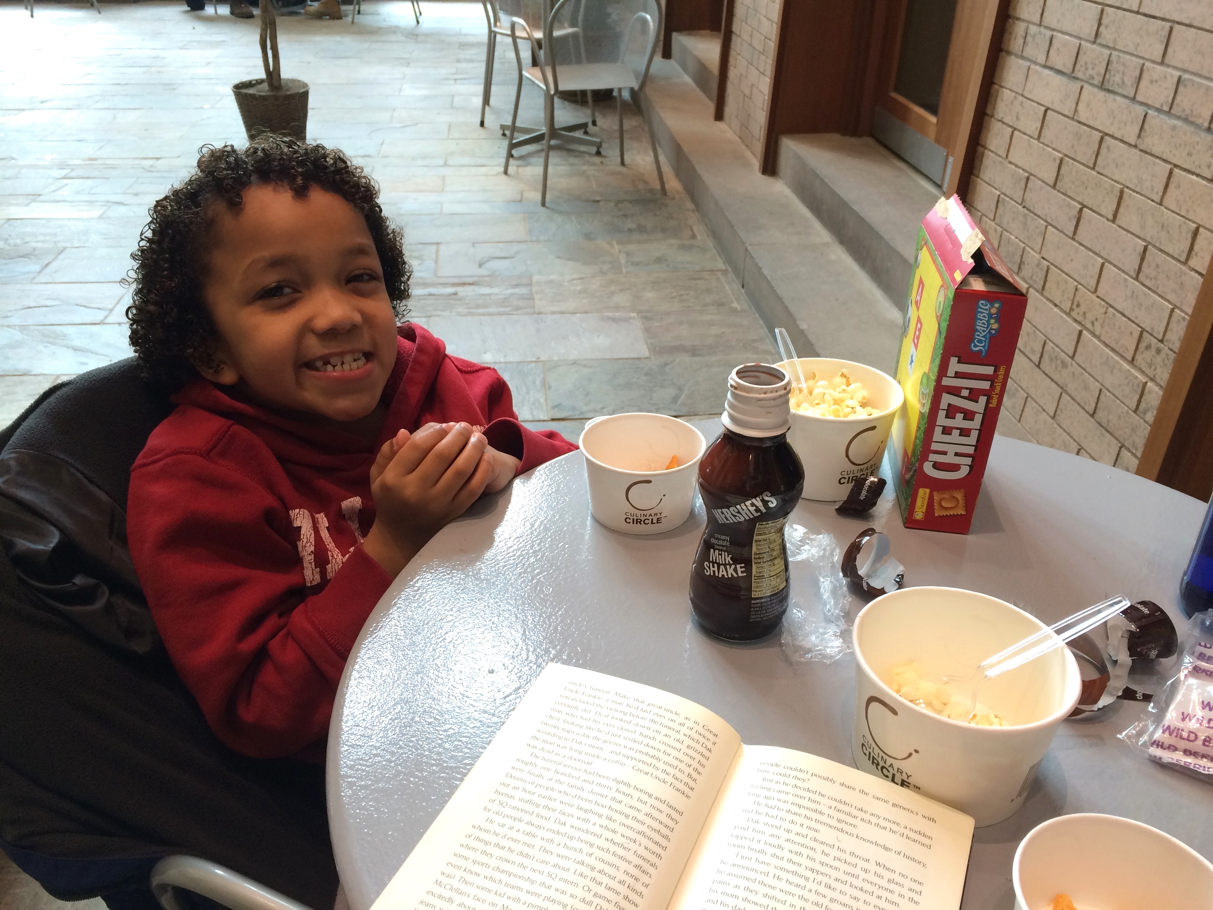 Eating snacks and reading at the local library