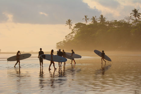 Surfers on the Pacific coast