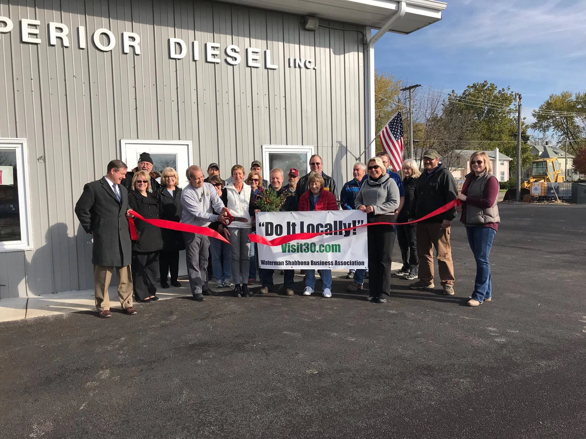 Red Ribbon Cutting Nov. 3, 2017 with Waterman-Shabbona Business Association members at Superior Diesel celebrating their facility improvements.