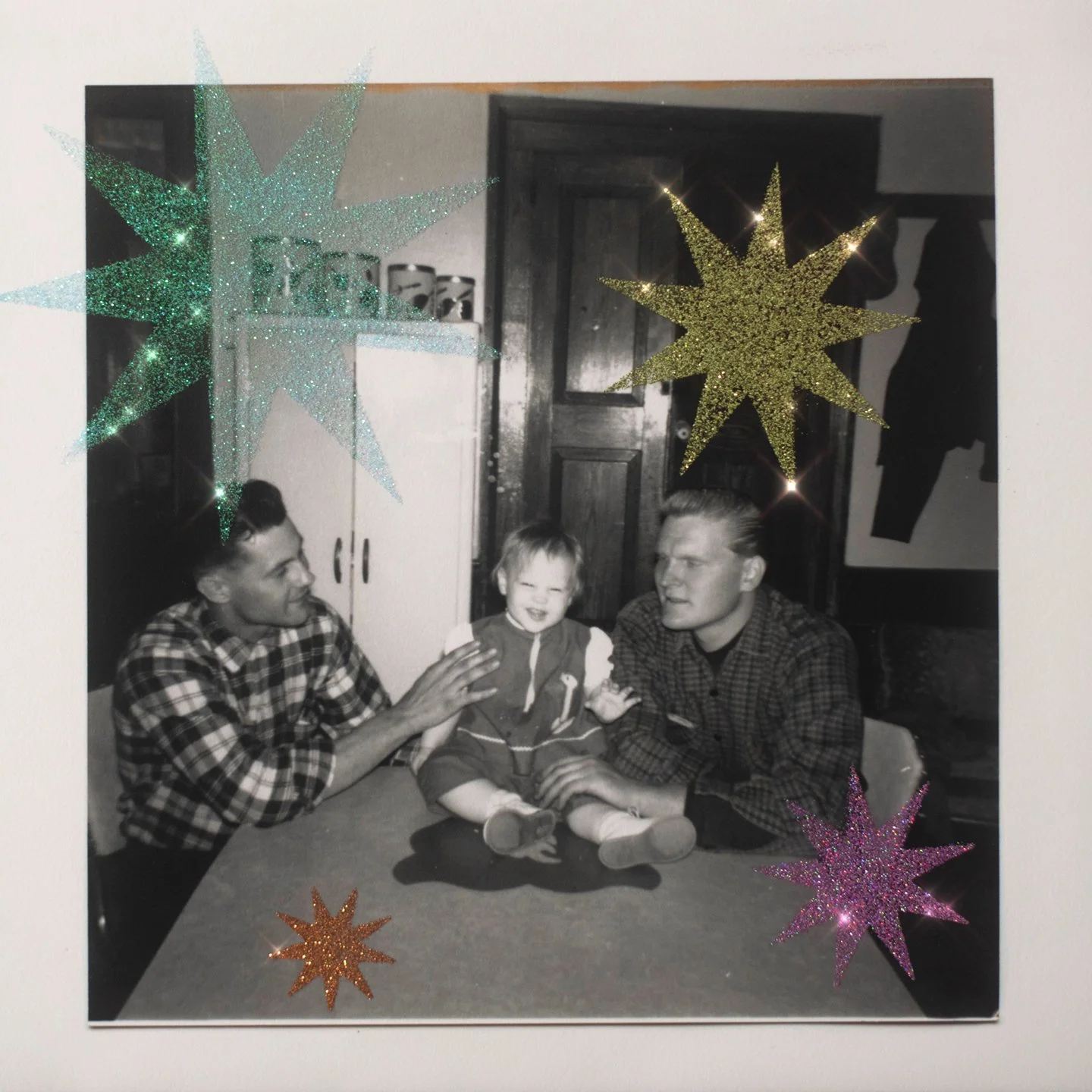 Me, Daisy (about 1yr old) and Grant, at our kitchen table.