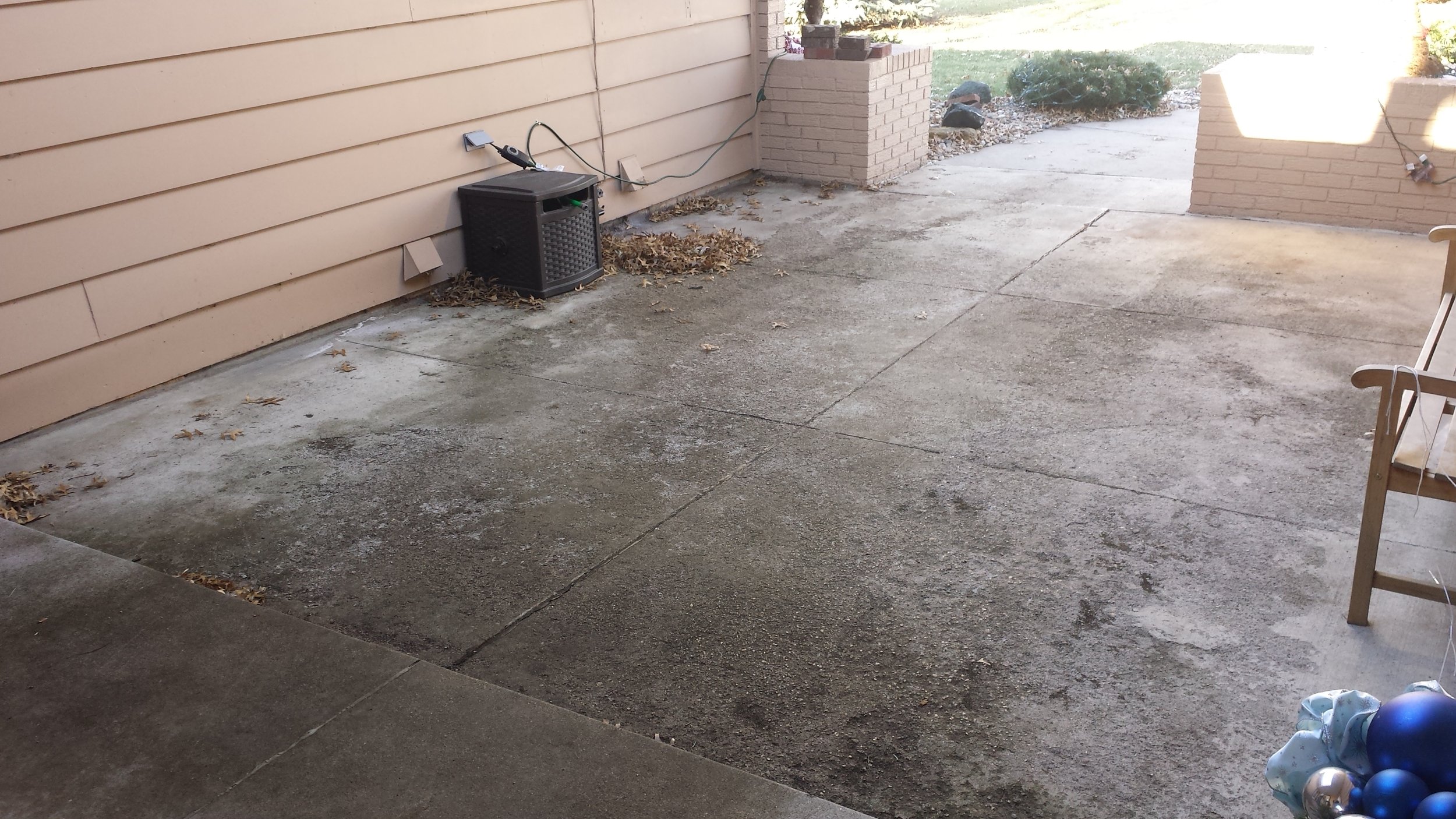 Badly deteriorated patio not draining