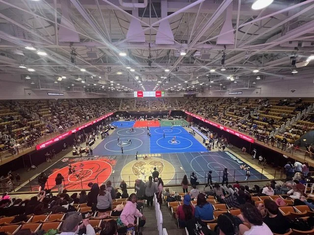 Harrah's Cherokee Center - Asheville Arena, set up for the Ingles Smoky Mountain Grapple Wrestling Tournament with eight wrestling mats.