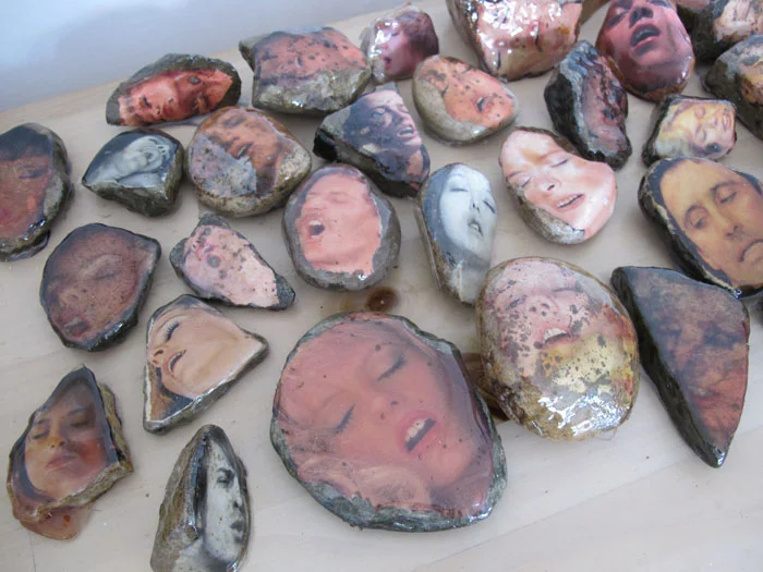 Aura Rosenberg, Dialectical Porn Rock, Untitled, (Faces Circle #1) (detail), 1989/2012, rocks, magazine clippings, resin, dimensions variable