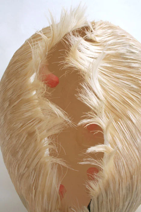 Jiyeon Park, Wink , 2011, paper mache, acrylic medium, artificial hair, 10 x 11 x 8 in