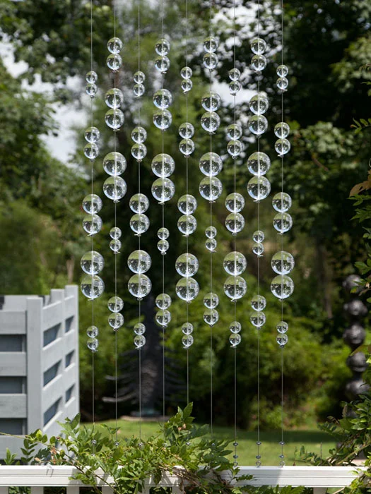 Lisa Beck, Window Pane (detail), 2012, lucite balls, stainless steel cable and hardware, 38 x 26 x 3 in