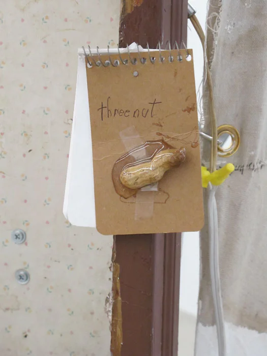Justin Lieberman, Storygon Studio (detail), 2012, mixed media including ceramics Porygons, taxidermy crabs, 13 artist books, audio cassettes, CDs, thigh bone of giraffe, electricity, and a painting, 85 x 34 x 45 in