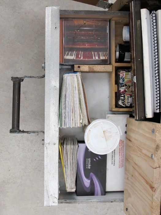Justin Lieberman, Storygon Studio (detail), 2012, mixed media including ceramics Porygons, taxidermy crabs, 13 artist books, audio cassettes, CDs, thigh bone of giraffe, electricity, and a painting, 85 x 34 x 45 in
