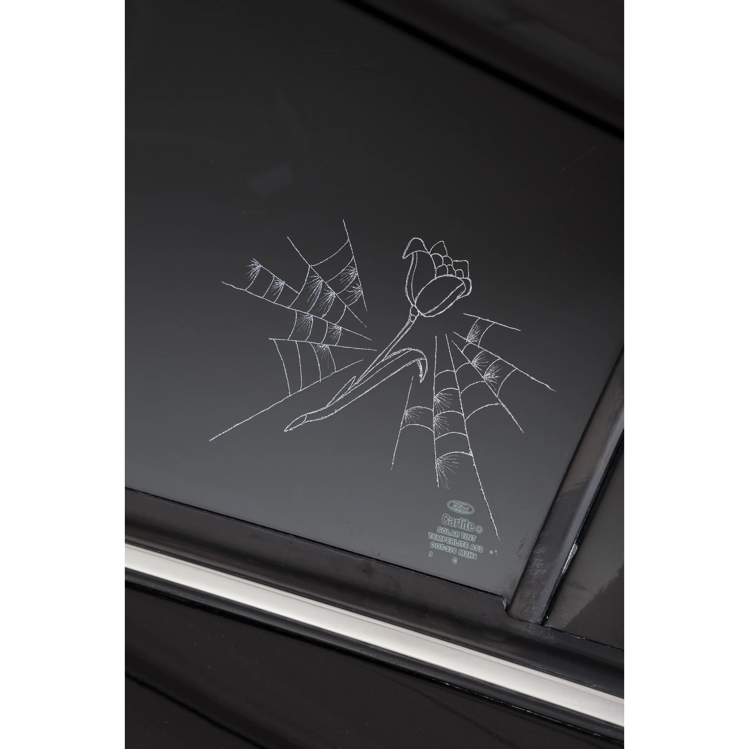 Scott Campbell, Crown Victorious (detail), 2015, remodeled Ford Crown Victoria with
24-carat
gold leaf, 212 x 77 x 57 in