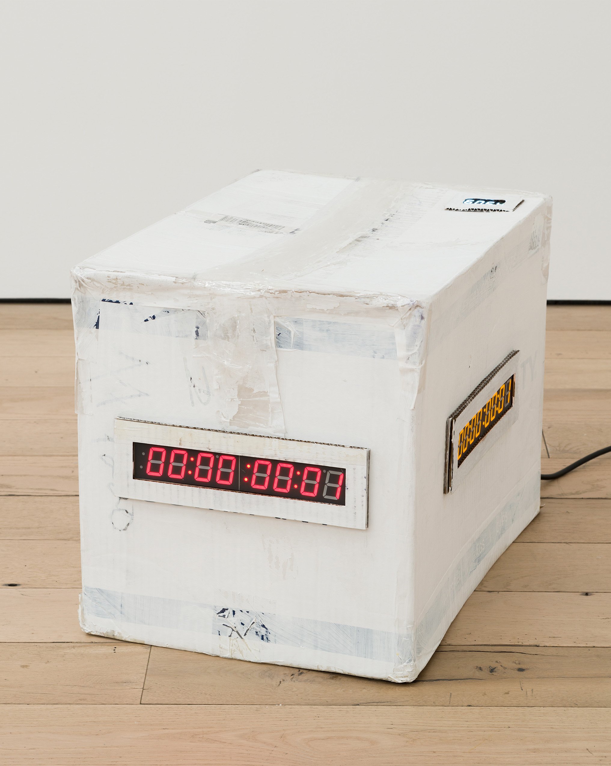  Sandy Williams IV,  Unattended Baggage (Time Capsule) XII , 2022, Timers, motion sensor, cardboard, electronics, gesso, tape, 21 1/2 x 15 1/2 x 16 1/2 in 