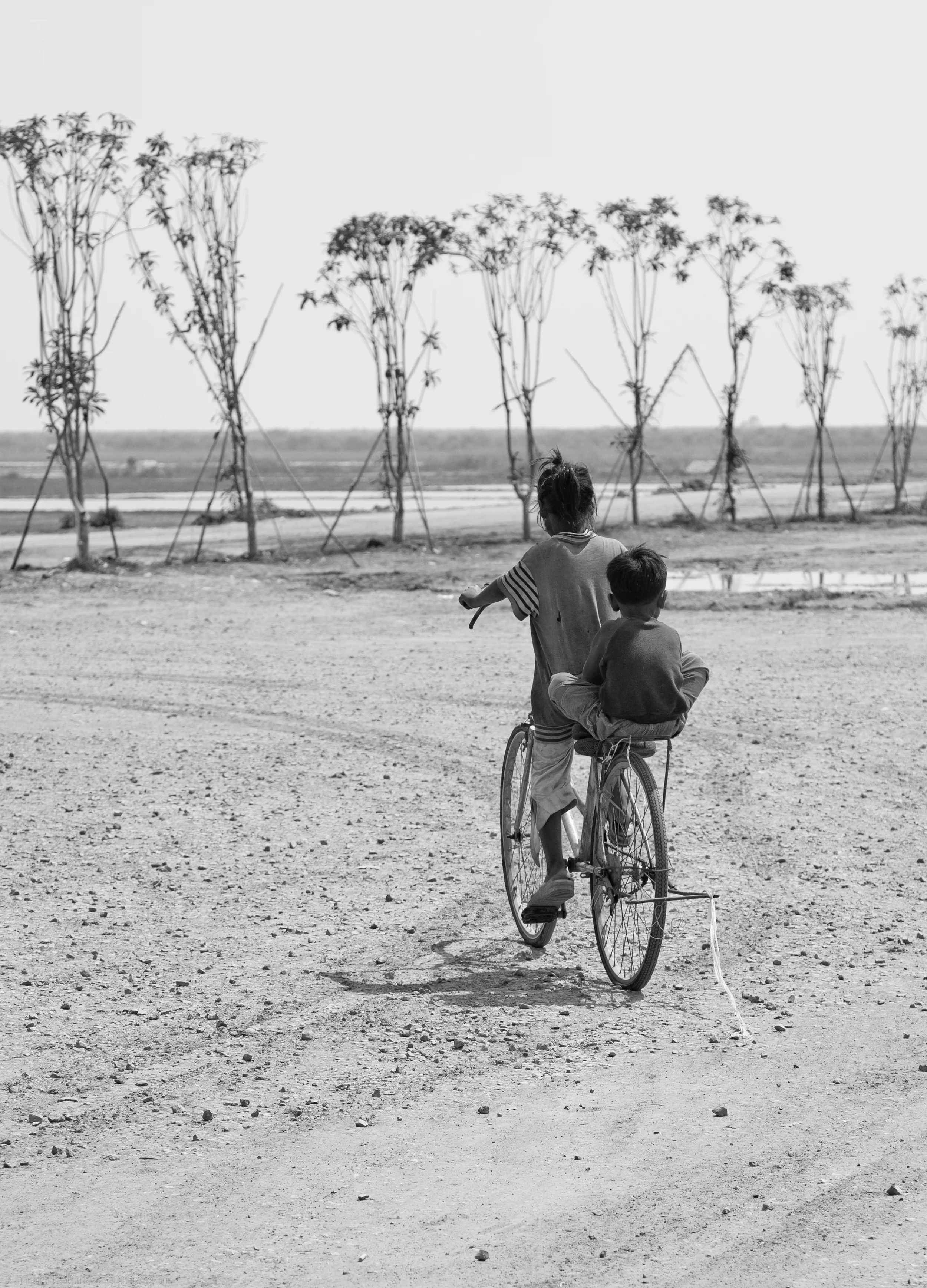 Little brothers going home in Tonle Sap - Cambodia