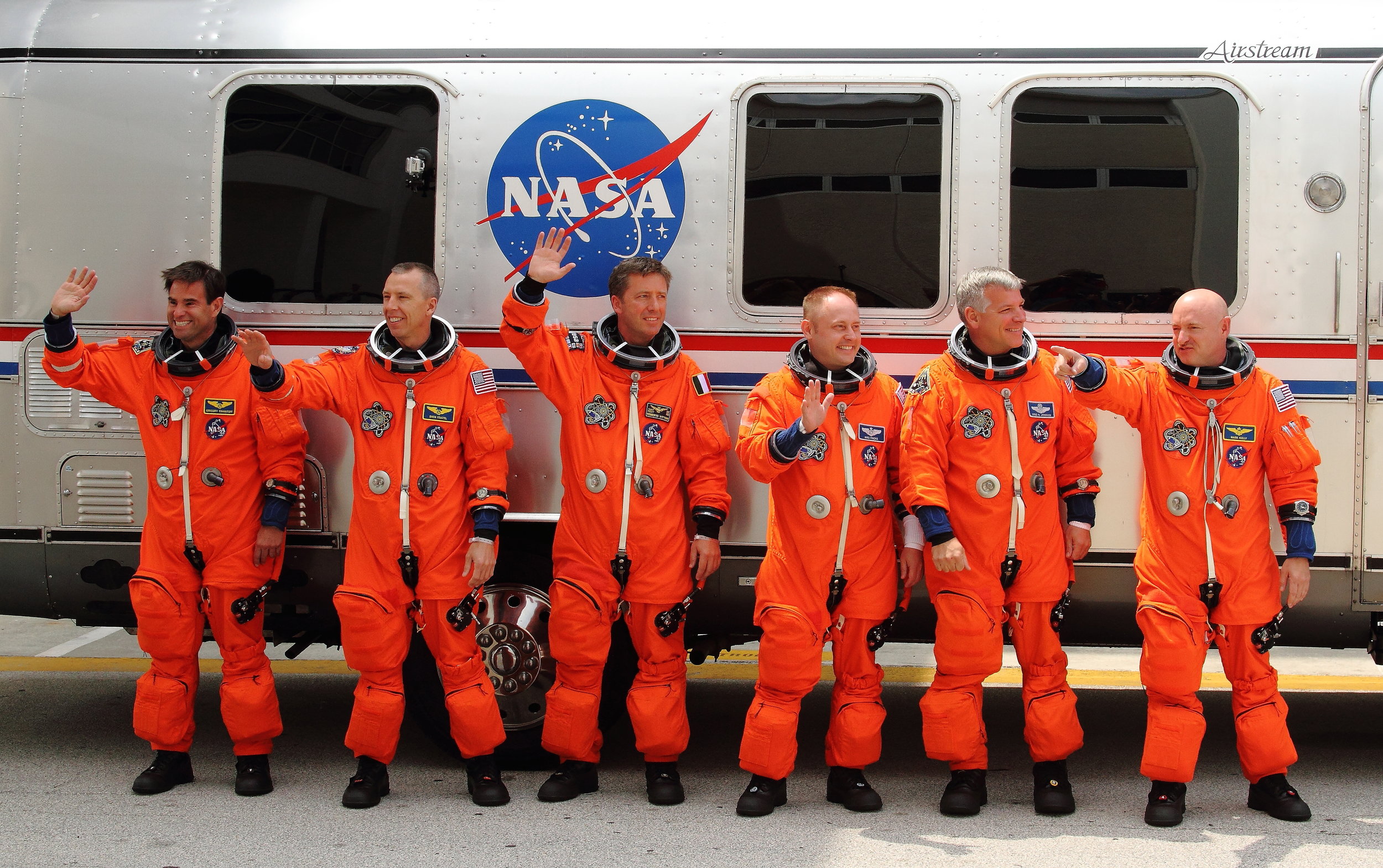  The Crew of STS 134 posing in front of the Astro Van before heading to the Launch Pad.&nbsp;Mission Specialists Gregory Chamitoff, Andrew Feustel, Roberto Vittory, Michael Fincke, Pilot Gregory Johnson and Commander Mark Kelly 