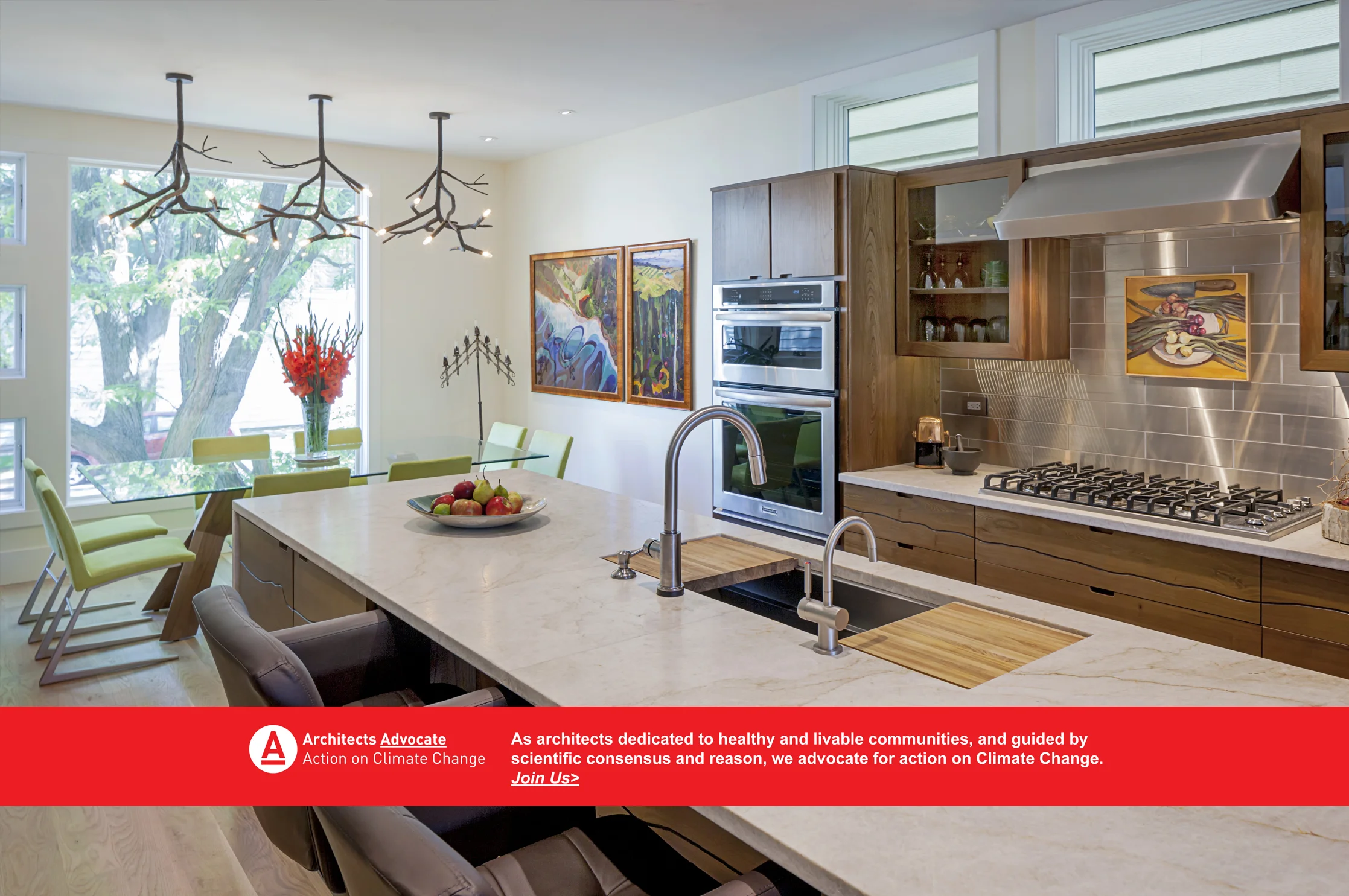 Architects Advocate: Action on Climate Change Net Positive Home Chicago Interior Kipnis Architecture and planning cabinets clerestory windows cooktop dining lighting dining room double oven eco-friendly energy efficient dining table island kitchen luxury metal backsplash modern Net Positive net zero reclaimed wood stainless backsplash stone countertop 
