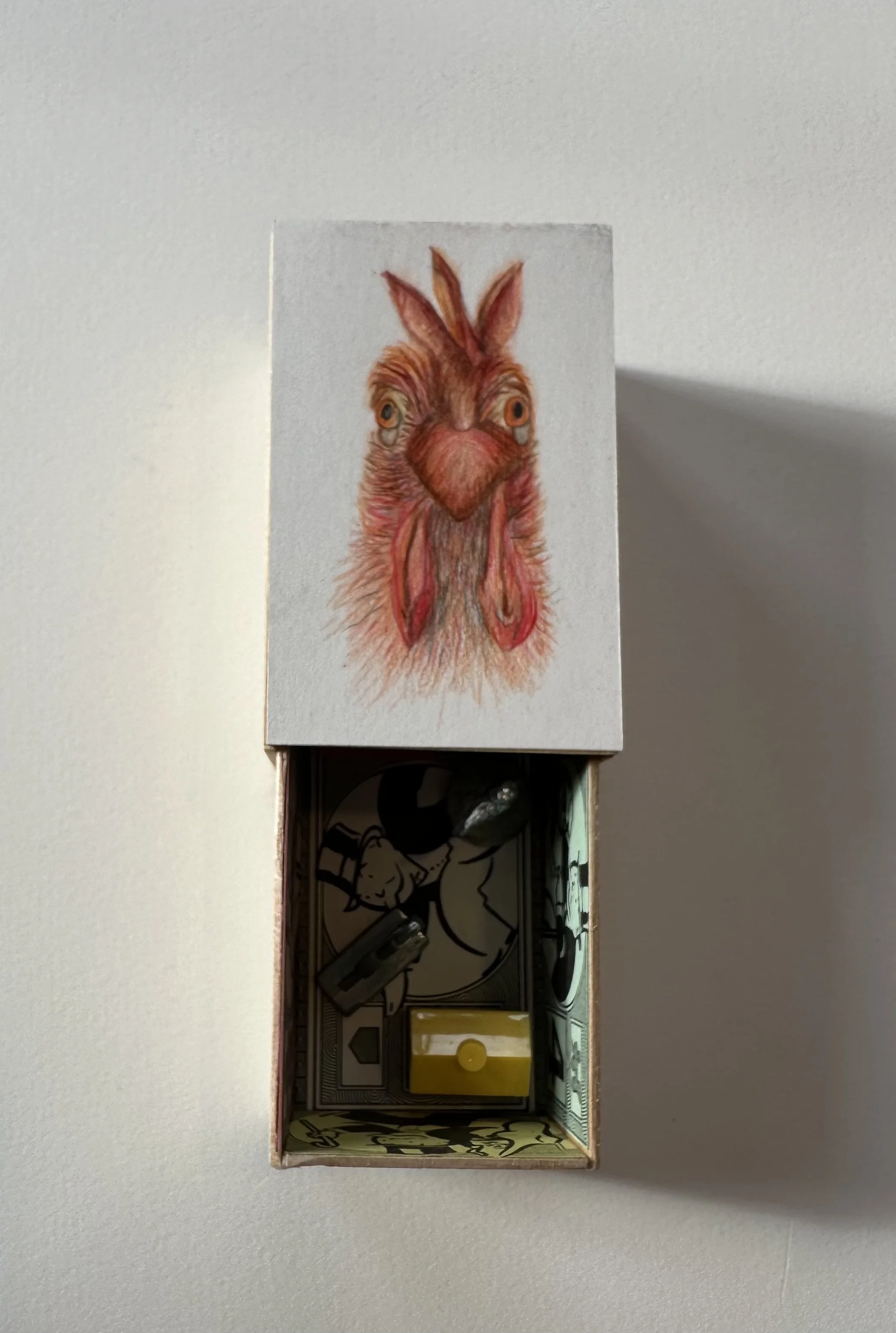 "Brama Rooster", bass wood artist made box, prisma color pencils, graphite, objects, 2" x 1.5" x 3", $200