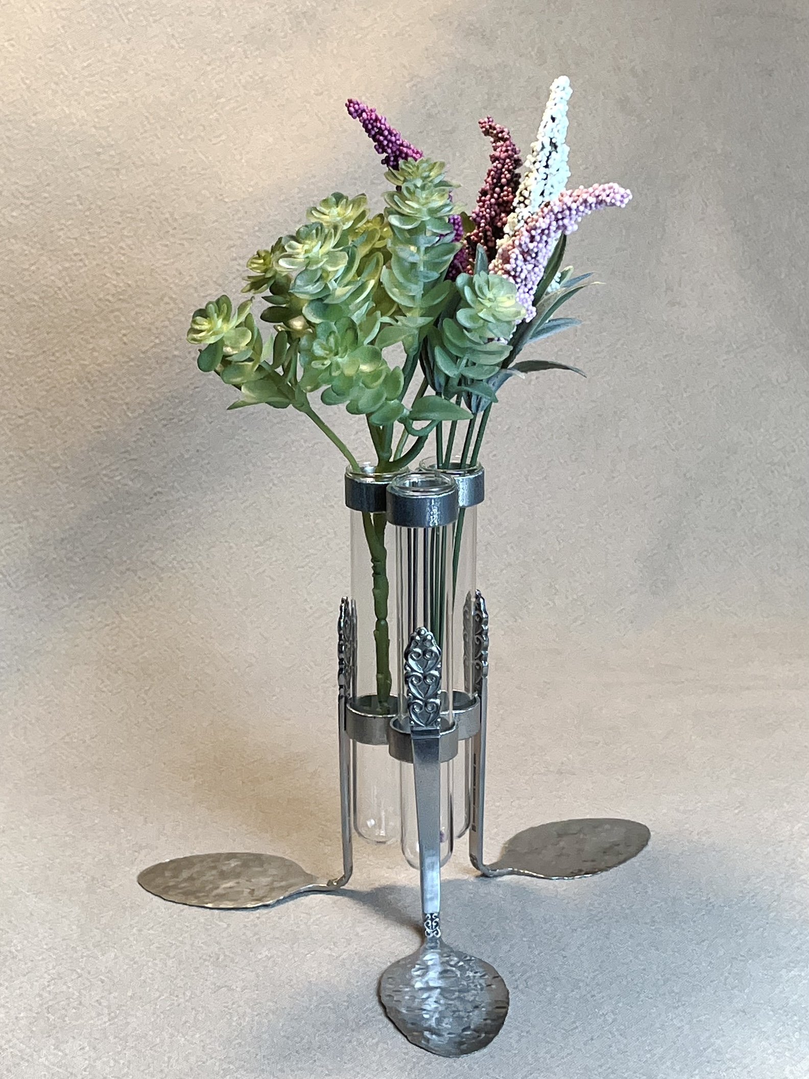 "Test Tube Propagation", display vase, stainless steel, 6.75" tall, 8" diameter base, $60 SOLD