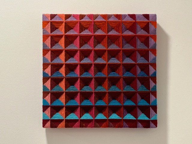 "Hot Spring", rug wool on wood frame, 12” x 12”, $600