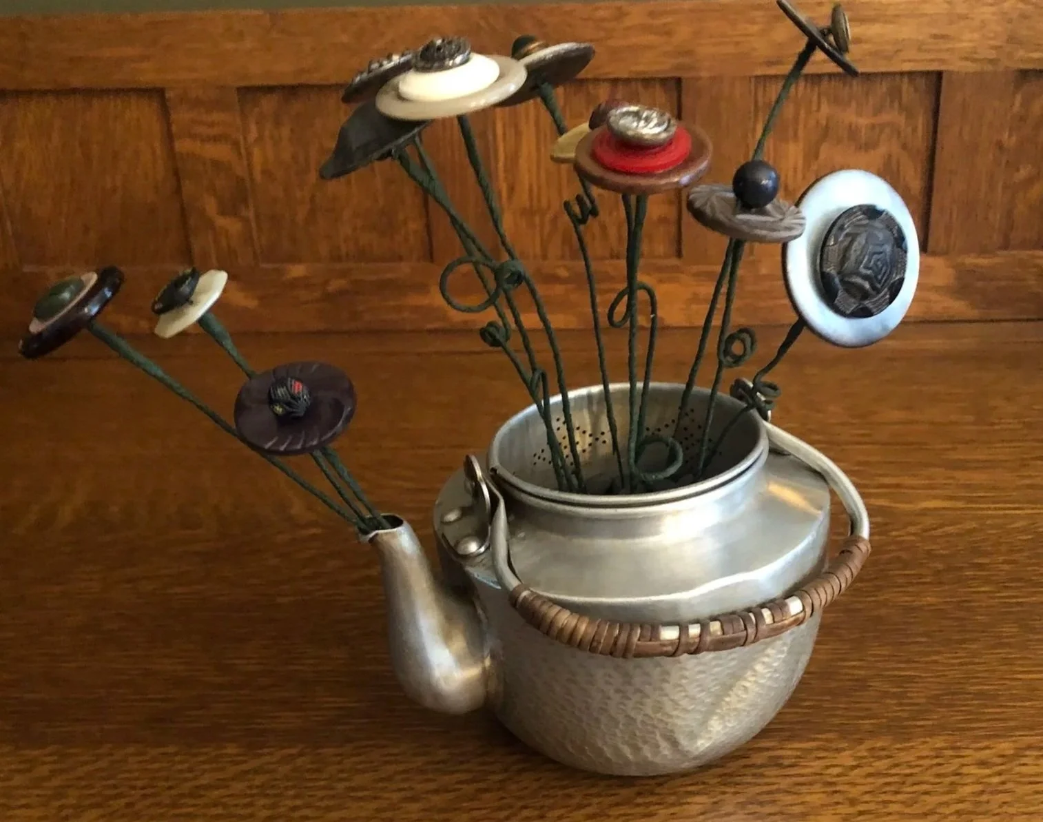 &lt;p&gt;&lt;strong&gt;LAURIE BOGDAN&lt;/strong&gt;mixed media, vintage buttons&lt;a href="/laurie-bogdan-ill2025"&gt;More →&lt;/a&gt;&lt;/p&gt;