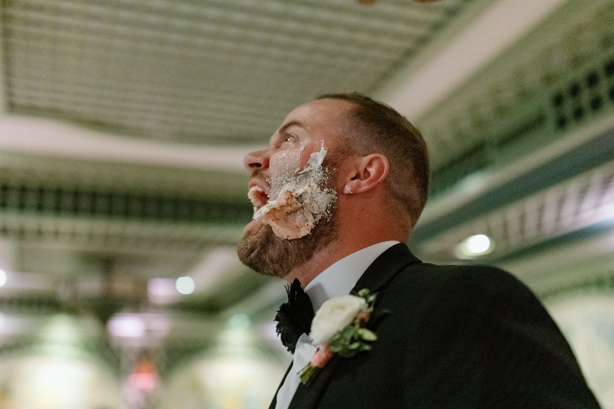 Groom after getting Wedding Cake smashed into his face, Brennan's Wedding