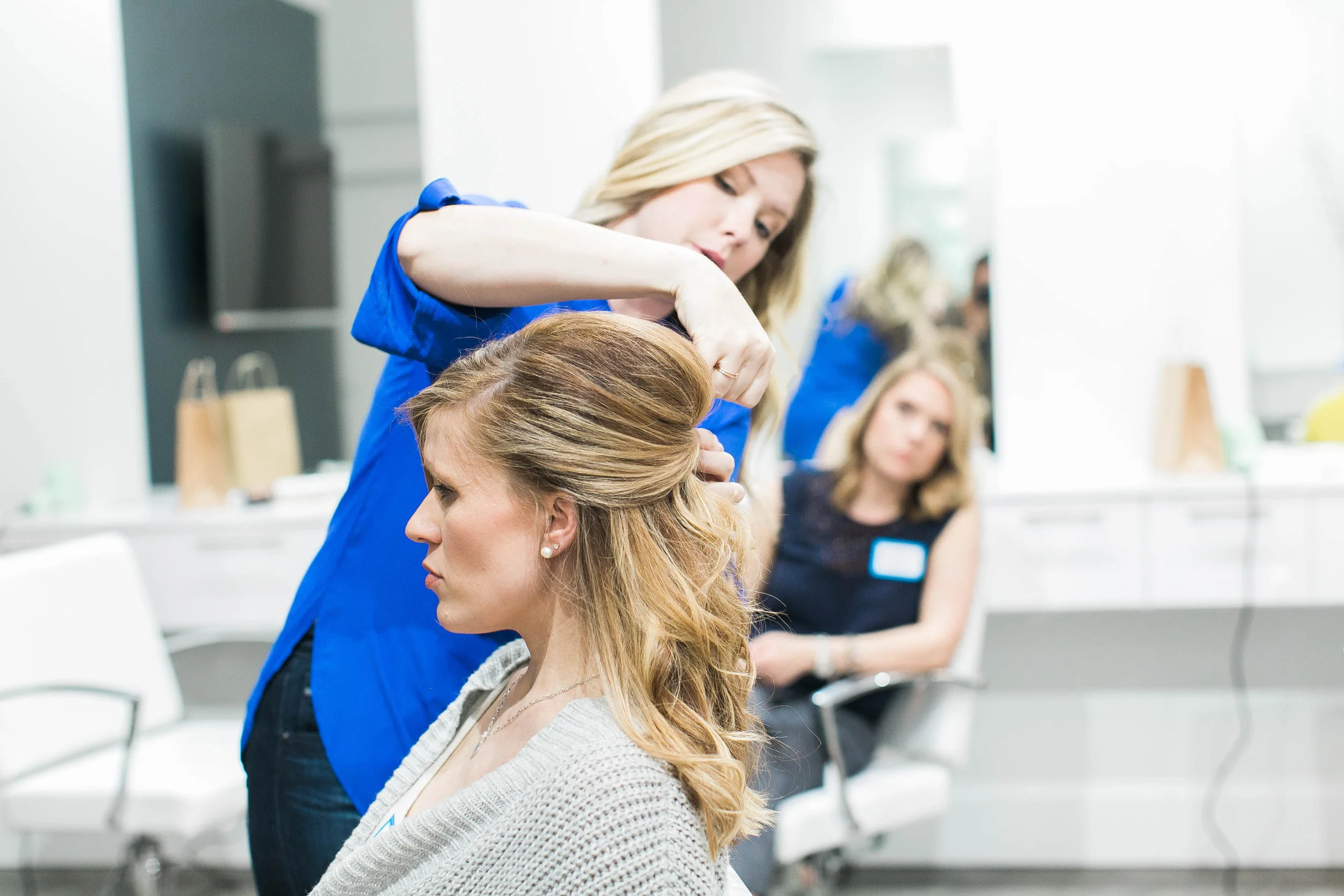 Kate using Jamie as her model. Photo by Jordan Maunder