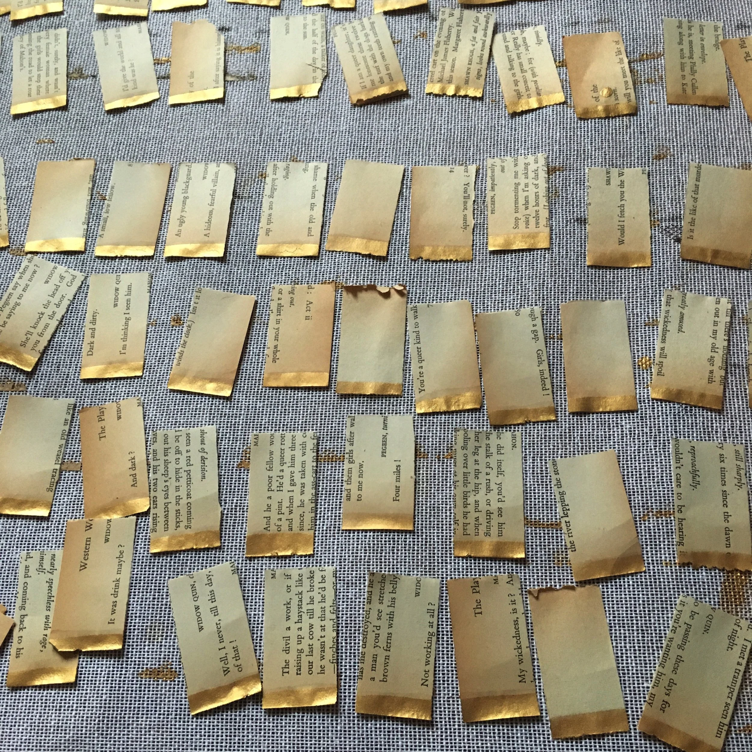 Experimenting with gold paint for a piece called Tower of Trump . The book from which the pages will be used will be revealed when the piece is completed. Pictured are practice pieces from another book.