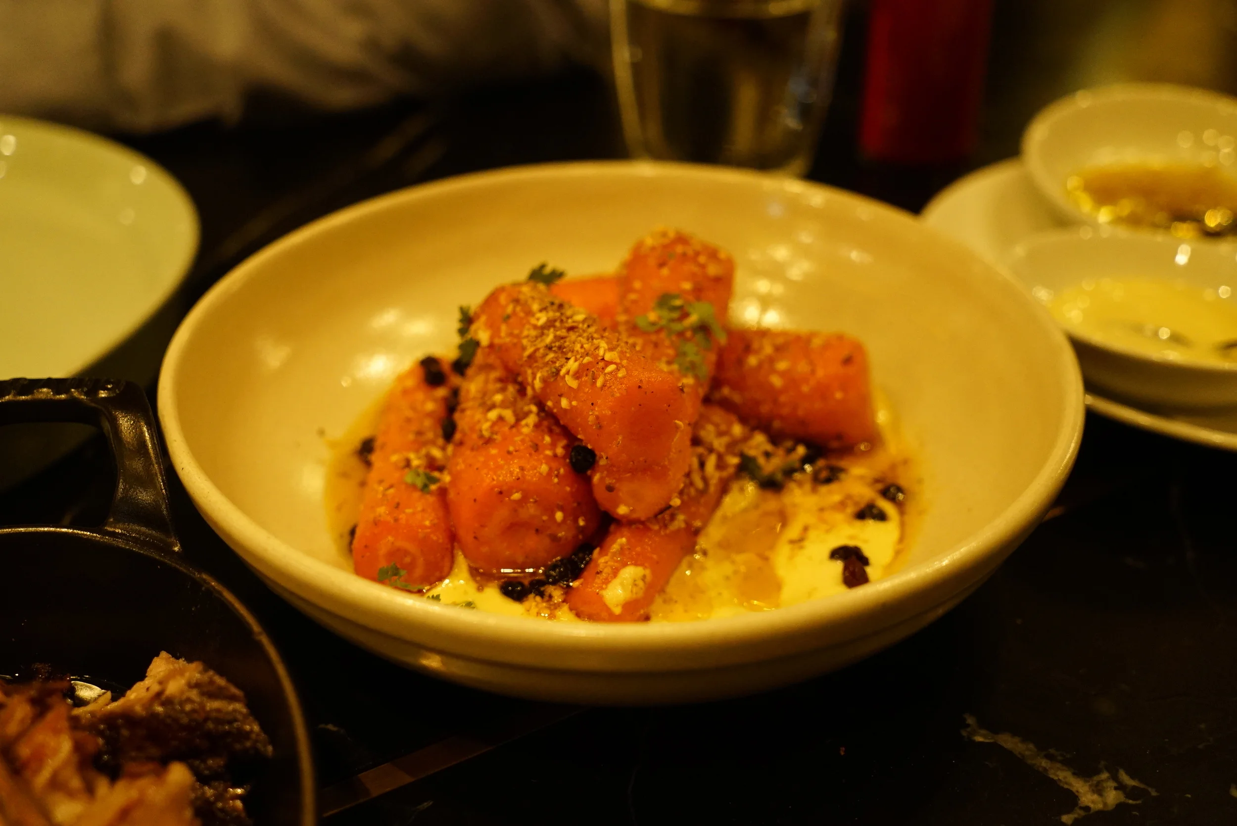 Wood fired carrots with dukkah and soaked currents.