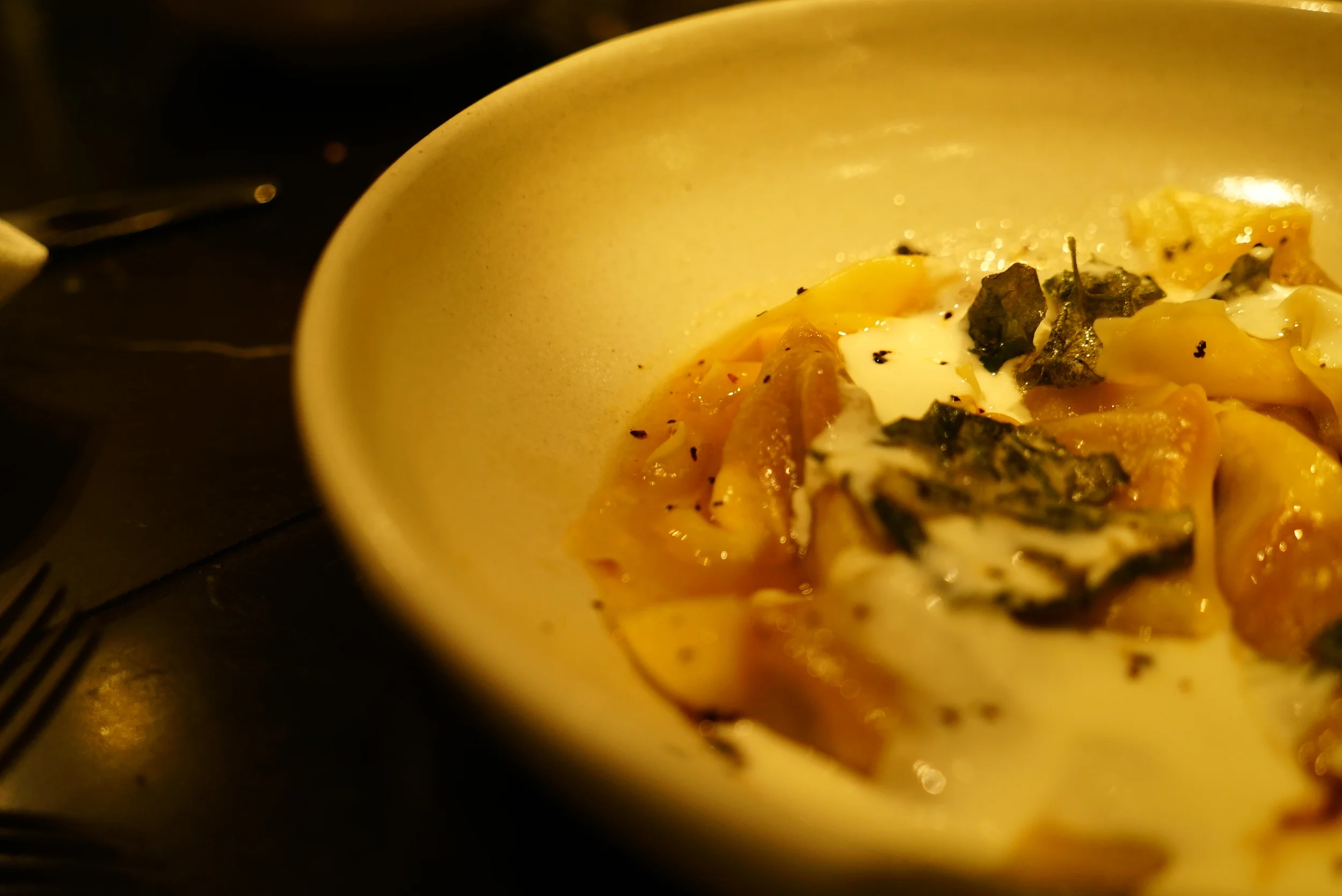 Turkish ravioli of wood fired pumpkin, yoghurt and isot pepper