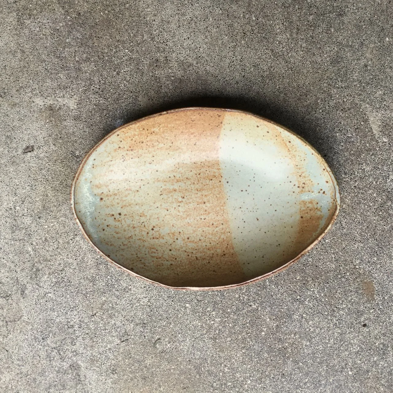 Oval Bowl 11" x 7" and about 1.5-2" deep, $48 each Matte speckled rusty tan glaze shown
