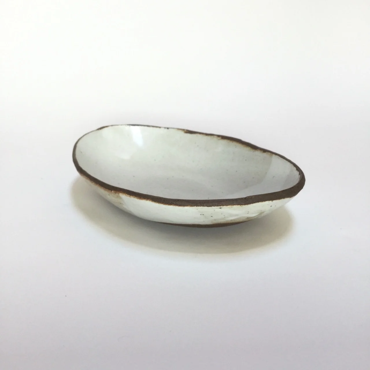 1090 Glossy white oval black rim side 2.jpg