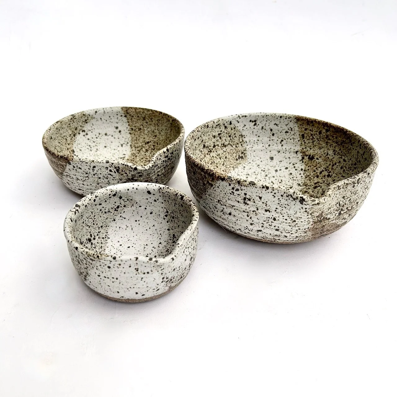 2676 Unnested speckled spouted side.jpeg