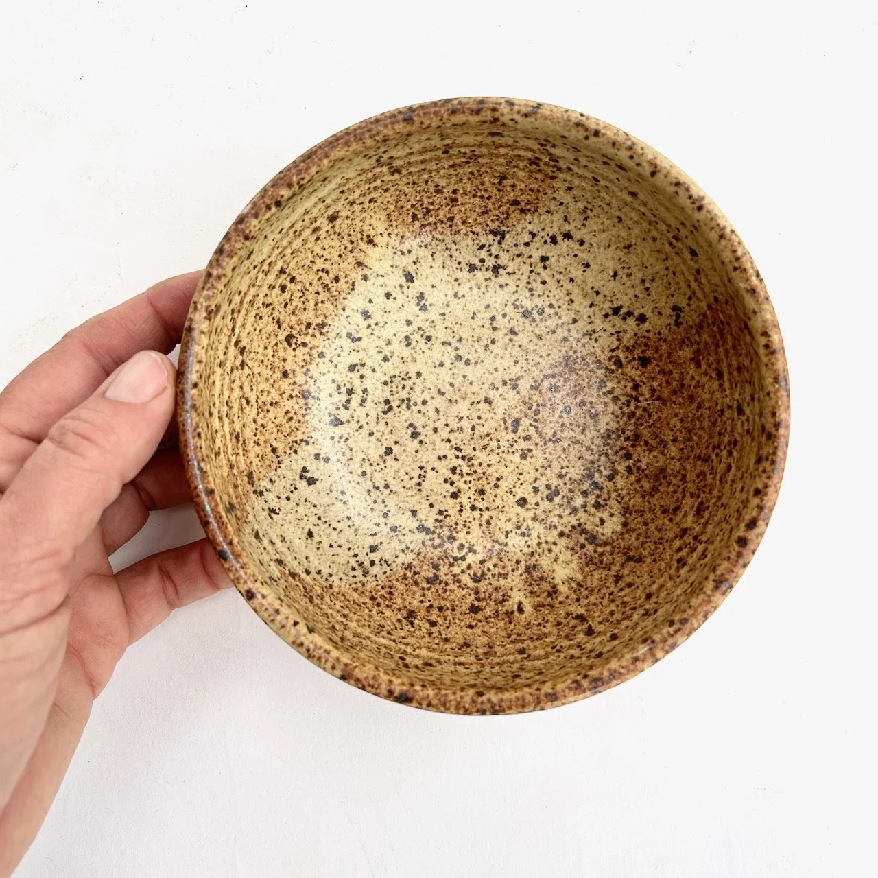 2702 Cereal bowl with hand.jpeg