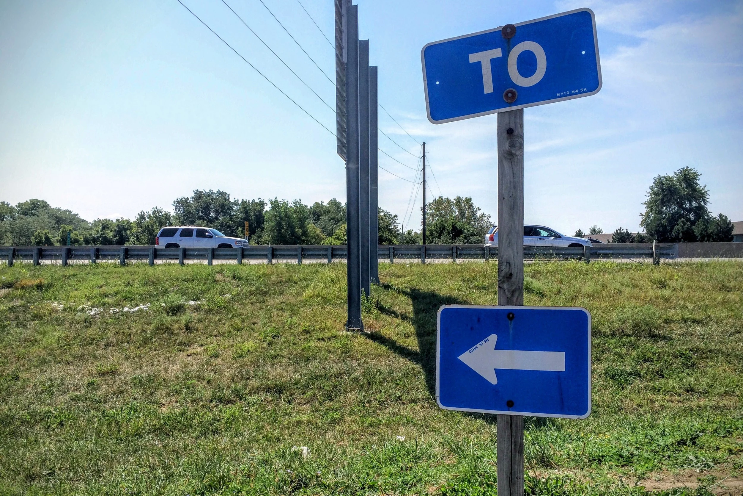 one sign that says to another is an arrow