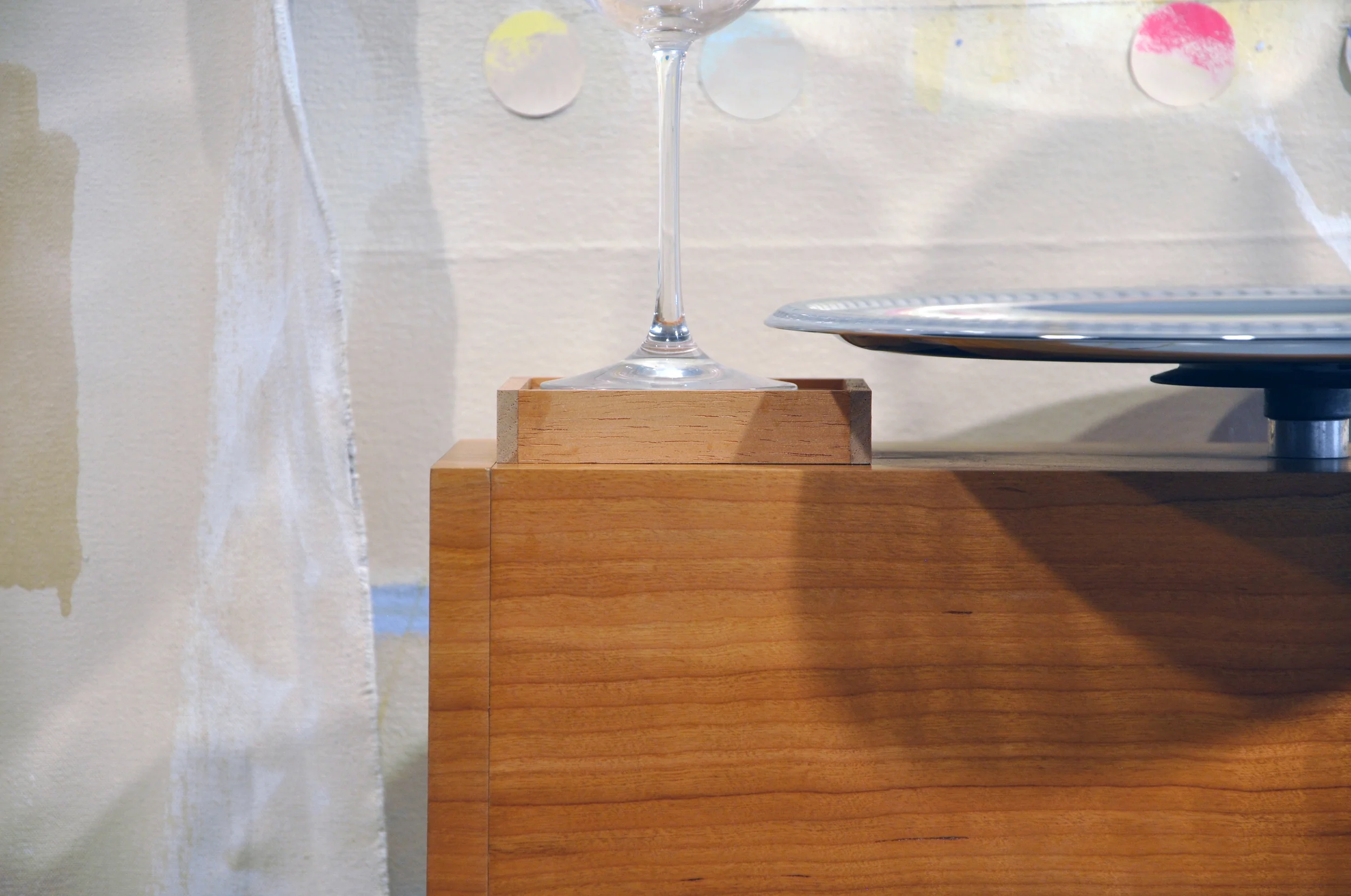 2016 , walnut veneer, MDF, DC motor, chrome platter, wine glasses, oil on canvas, sheetrock, joint compound