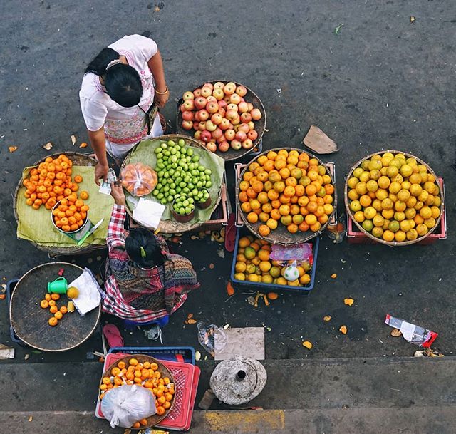 Colours of the Markets

It's a routine.  Early morning, before sunrise, sellers at the street markets head out in the dark to the local fruit and veggie wholesalers.  Digging out their phones, they search for the setting to turn on the flashlight, an